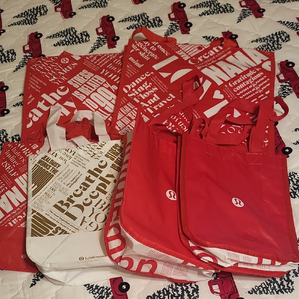 6 Bags Lululemon reusable Red and White Bags.